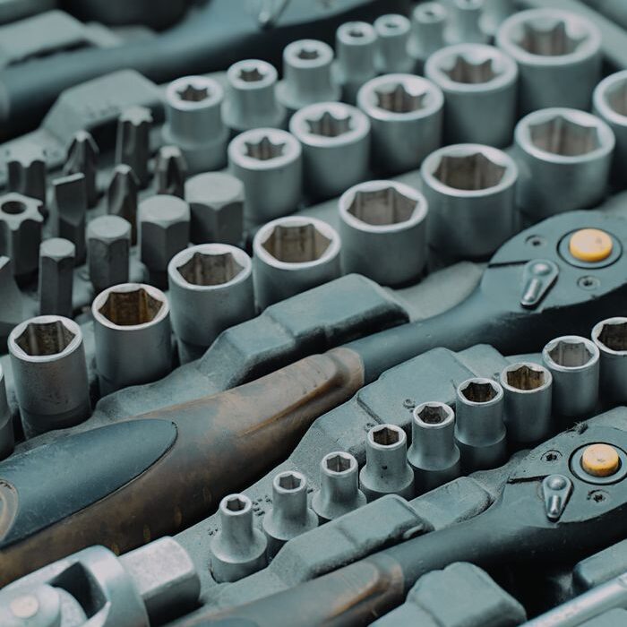 Detailed view of a ratchet and socket tool set, ideal for mechanics and DIY projects.